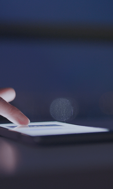 hand on a tablet, symbolizing easy and modern ways to get in touch